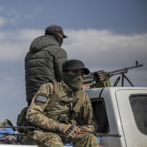 Members of the new Syrian government's army are seen amid battles with militias loyal to the Assad regime on the Syrian coast near Latakia, Syria, on March 7, 2025. 