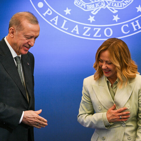 Turkey's President Recep Tayyip Erdogan (L) and Italy's Prime Minister Giorgia Meloni react during a press conference as part of Turkey's President's visit at the Villa Doria Pamphili in Rome on April 29, 2025. Turkish President arrived in Rome for talks with Italy's Prime Minister on April 29, 2025, as the two Mediterranean countries seek to boost trade and cooperation, and will discuss the war in Ukraine and the "situation in the Middle East" before a summit where government ministers are expected to sign