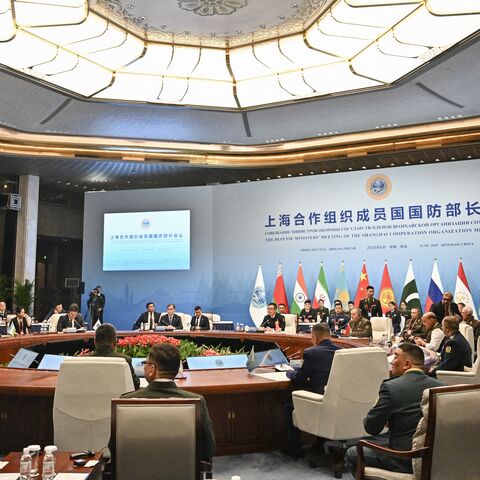 Delegates attend the Defense Ministers' Meeting of the Shanghai Cooperation Organization member states in Qingdao, in eastern China's Shandong province on June 26, 2025.