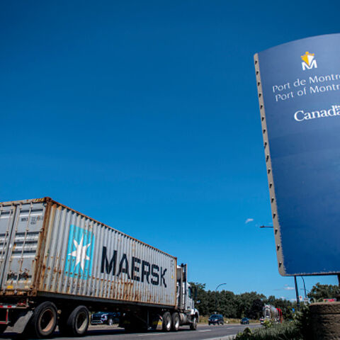 A truck with a container leaves the Port of Montreal in Montreal, Quebec, Canada, on August 1, 2025. US President Donald Trump unveiled new tariffs on July 31 on nearly 70 countries -- including a blistering 35 percent on neighbor Canada -- as he seeks to reshape global trade to benefit the US economy. However, in a minor reprieve that opens the door to further negotiations, the White House said the measures will take effect in a week for most countries, not Friday as previously expected. (Photo by ANDREJ I