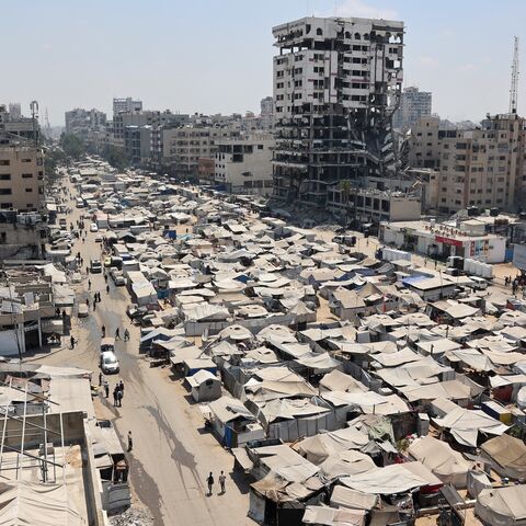 Tents housing displaced Palestinians line a street in Gaza City, Aug. 18, 2025.