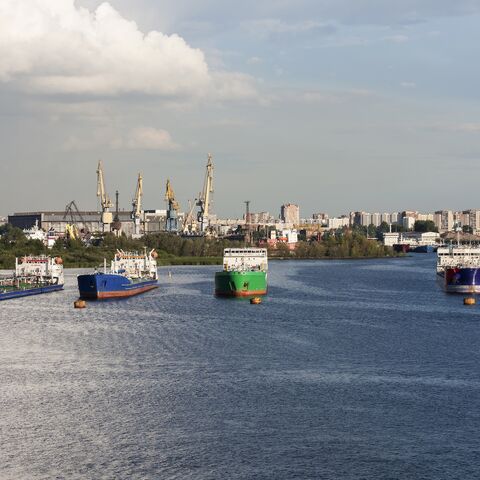 Oil tankers and cranes at Merchants Harbor, Saint Petersburg, Russia.