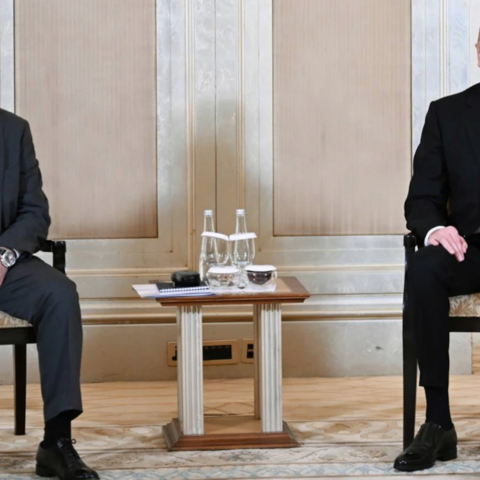 Azerbaijani President Ilham Aliyev (R) and Armenian Prime Minister Nikol Pashinyan meet in Abu Dhabi on July 10, 2025.