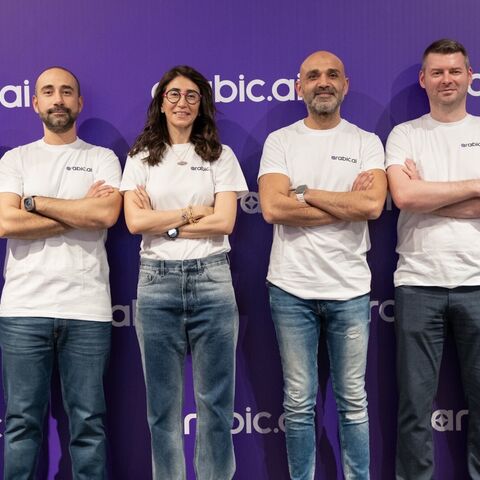 Nour Al Hassan, founder and CEO of Tarjama (C), and members of the Tarjama team promoting Arabic.AI, the firm's new platform offering business solutions, 2025.