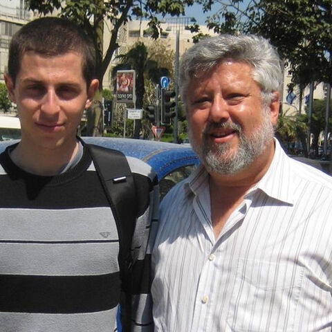 Israeli soldier Gilad Shalit (L) and Israeli peace activist and hostage negotiator Gershon Baskin (R) after Shalit's release in 2011.