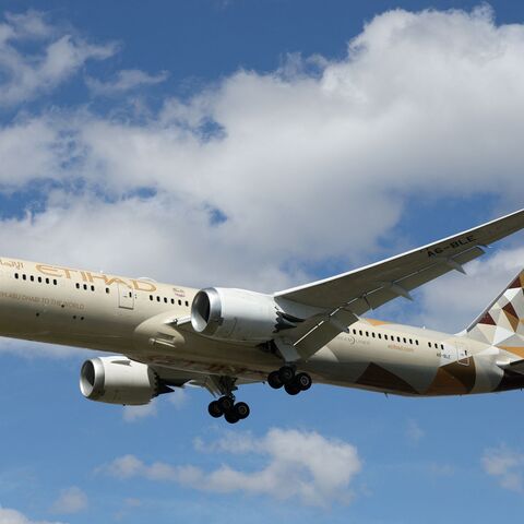 An Etihad Airways Boeing 787-9 Dreamliner comes in to land at Heathrow Airport in west London on April 29, 2024. (Photo by Adrian DENNIS / AFP) (Photo by ADRIAN DENNIS/AFP via Getty Images)