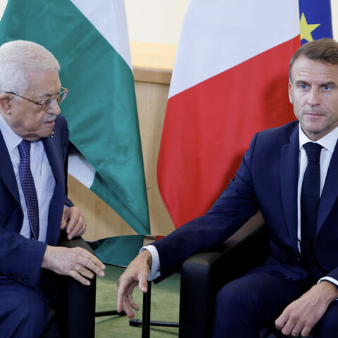 French President Emmanuel Macron (R) meets with Palestinian President Mahmud Abbas on the sidelines of the 79th Session of the United Nations General Assembly in New York on September 25, 2024. (Photo by Ludovic MARIN / AFP) (Photo by LUDOVIC MARIN/AFP via Getty Images)