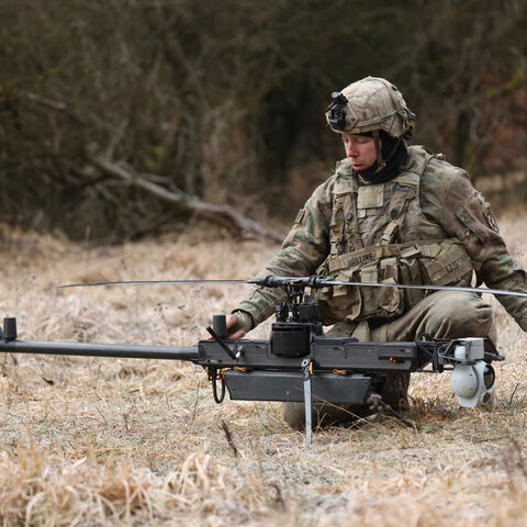 A soldier of a UAS (Unmanned Aircraft System) platoon of the U.S. Army 3rd Brigade, 10th Mountain Division, readies a Anduril Ghost-X helicopter surveillance drone for take-off during the Combined Resolve 25-1 military exercises at the Hohenfels Training Area in Bavaria on Feb. 3, 2025 near Hohenfels, Germany. 