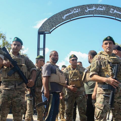 Lebanese soldiers stand guard outside an army base in the southern city of Tyre, on Aug. 28, 2025.