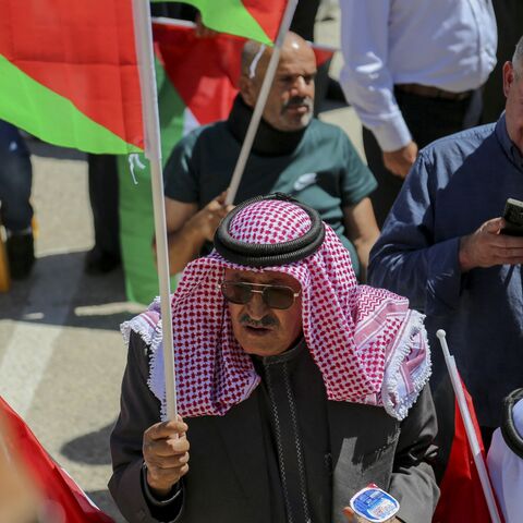 Representatives of prominent families in Hebron attend a gathering.