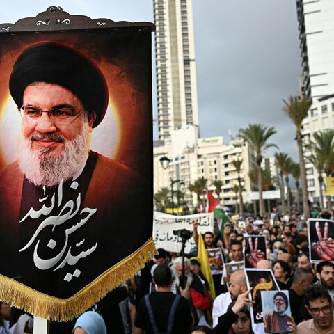 Supporters of Lebanon's Hezbollah group take part in a gathering in Beirut on Sept. 17, 2025.