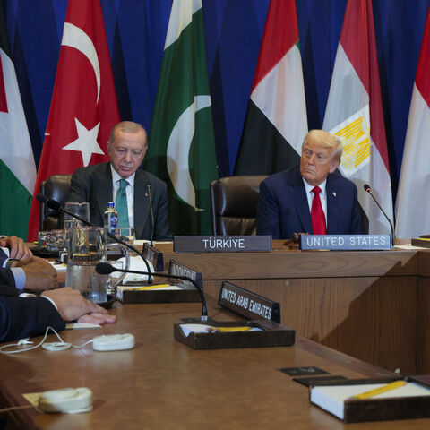 President Donald Trump (C-R) and President of Turkey Recep Tayyip Erdogan (C-L) listen during a multilateral meeting with leaders from several Arab and Muslim-majority countries at the 80th session of the UN’s General Assembly (UNGA) at the United Nations headquarters on Sept. 23, 2025 in New York City.