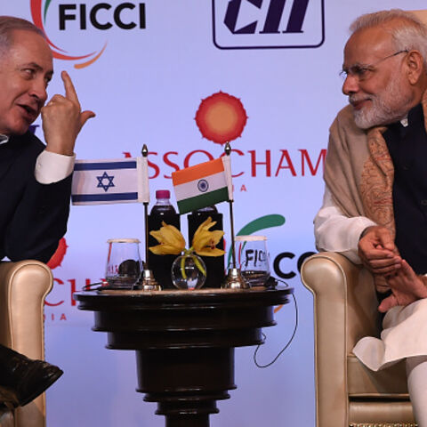 Indian Prime Minister Narendra Modi (R) and Israeli Prime Minister Benjamin Netanyahu talk during the India-Israel Business Summit in New Delhi on January 15, 2018. Benjamin Netanyahu hailed a "new era" in ties with India on January 15 as he signed a series of deals during the first visit by an Israeli Prime Minister in 15 years. Netanyahu made the comment after talks with Narendra Modi, who made history in July when he became the first Indian leader ever to visit Israel.