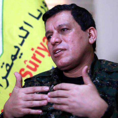 Mazloum Kobane, commander-in-chief of the Syrian Democratic Forces (SDF), speaks with AFP during an interview in the countryside outside the northwestern Syrian city of Hasakah, in the province of the same name, on Jan. 24, 2019.