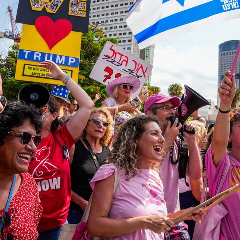 People celebrate at Hostages Square in Tel Aviv on Oct. 9, 2025, following the announcement of the new Gaza ceasefire deal. 