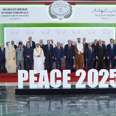 US President Donald Trump (C-R) and other world leaders pose for a photo during a summit of European and Middle Eastern leaders on Oct. 13, 2025, in Sharm el-Sheikh, Egypt.