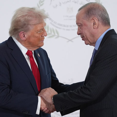 SHARM EL-SHEIKH, EGYPT - OCTOBER 13: U.S. President Donald Trump greets Turkey's President Recep Tayyip Erdogan during a world leaders' summit on ending the Gaza war on October 13, 2025 in Sharm El-Sheikh, Egypt. President Trump is in Egypt to meet with European and Middle Eastern leaders in what’s being billed as an international peace summit, following the start of a US-brokered ceasefire deal to end the war in the Gaza Strip. (Photo by Evan Vucci - Pool / Getty Images)
