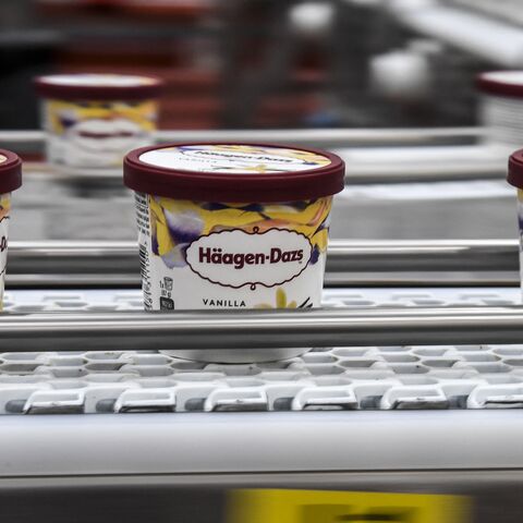 Cups of US ice cream brand Haagen-Dazs, are seen on a production line on Dec. 8, 2017, in a plant in Tilloy-les-Mofflaines, northern France. 