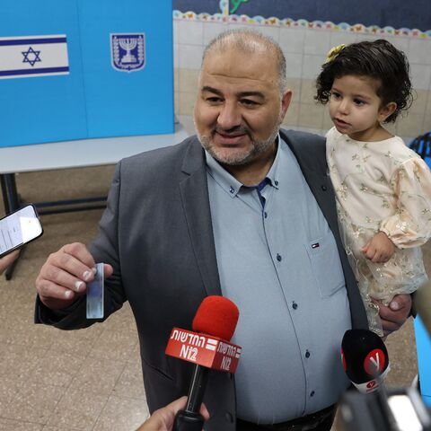 Mansour Abbas, head of Israel's conservative Islamic Raam party, speaks to the press before casting his ballot at a polling station in the northern Israeli village of Maghar on November 1, 2022. - Israelis began voting in their fifth election in less than four years, with veteran leader Benjamin Netanyahu campaigning for a comeback alongside far-right allies. (Photo by AHMAD GHARABLI / AFP) (Photo by AHMAD GHARABLI/AFP via Getty Images)