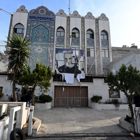 A picture taken in Damascus on Dec. 9, 2024, shows the building of the Iranian Embassy, which was ransacked after anti-government fighters took the Syrian capital the previous day, with a portrait of Iran's slain Revolutionary Guards commander, Qasem Soleimani, still hanging on its fence.