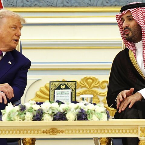 US President Donald Trump meets with Saudi Crown Prince Mohammed bin Salman during a “coffee ceremony” at the Saudi Royal Court on May 13, 2025, in Riyadh, Saudi Arabia. 