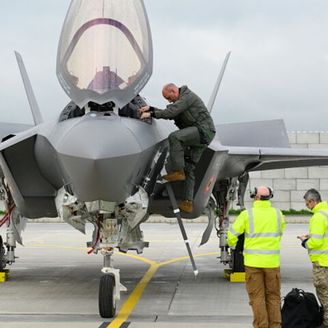 This photograph shows a pilot disembarking a Belgium's newly purchased Lockheed Martin F-35 Lightning II fighter jet for the first time, after arriving at the Florennes military airbase, southern Belgium on October 13, 2025. (Photo by JOHN THYS / AFP) (Photo by JOHN THYS/AFP via Getty Images)