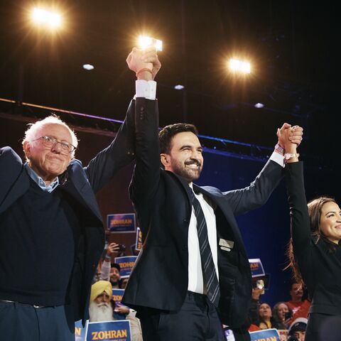 New York mayoral candidate Zohran Mamdani, center, celebrates with Sen. Bernie Sanders (I-VT), left, and US Rep. Alexandria Ocasio-Cortez (D-N.Y.), right.