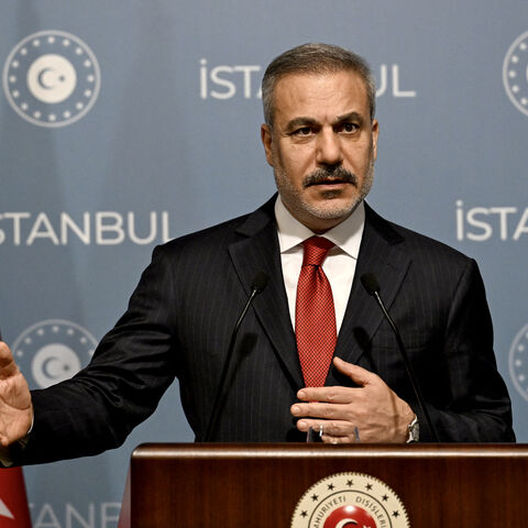 Turkish Foreign Minister Hakan Fidan gestures as he speaks during a press conference after a meeting with his counterparts from Saudi Arabia, Qatar, the United Arab Emirates, Jordan, Pakistan and Indonesia in Istanbul on November 3, 2025. Turkey on November 3, 2025, hosts a string of top diplomats from the Islamic world to bring their influence to bear on the future of Gaza, as fears grow for the increasingly fragile truce. The October 10 ceasefire in the two-year-long Israel-Hamas war, brokered by US Presi