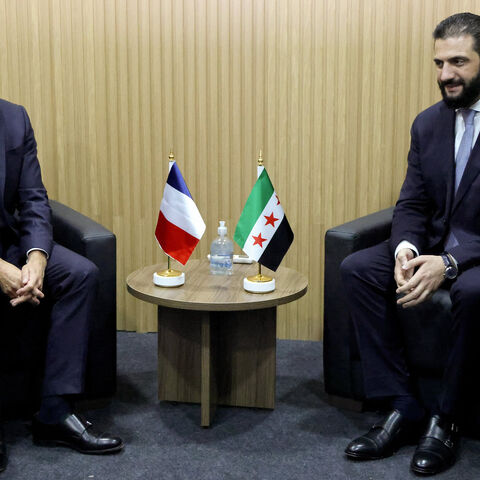 France's President Emmanuel Macron and Syria's President Ahmed al-Sharaa look on during a bilateral meeting within the framework of the COP30 UN climate conference in Belem, Brazil, Nov. 6, 2025.
