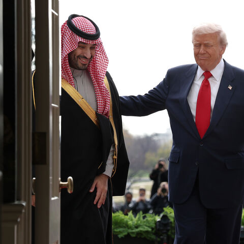 US President Donald Trump (R) welcomes Crown Prince and Prime Minister Mohammed bin Salman of Saudi Arabia during an arrival ceremony at the White House on November 18, 2025 in Washington, DC. Trump is hosting the crown prince for meetings aimed at strengthening economic and defense ties, including the U.S. sale of F-35 fighter jets to Saudi Arabia. (Photo by Win McNamee/Getty Images)
