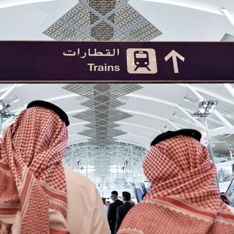 People walk on the platform of the Haramain High Speed Rail Network at the airport station in the Red Sea city of Jeddah, on Dec. 12, 2019.