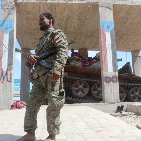 Fighters affiliated with Yemen's separatist Southern Transitional Council (STC) man a position as they deploy amid tensions in the southern port city of Aden, on February 3, 2022, after Washington announced sending a warship and fighter jets to help defend its Gulf allies as conflict with Yemeni rebels intensifies. (Photo by Saleh Al-OBEIDI / AFP) (Photo by SALEH AL-OBEIDI/AFP via Getty Images)