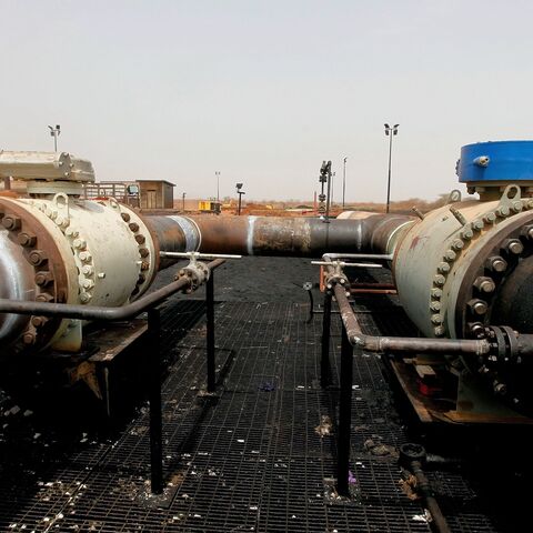 Sudanese repair crew work at the Heglig oil facility, after Sudan started pumping oil again from the war-damaged oil field on May 2, 2012, 12 days after occupying South Sudanese troops left the area. 