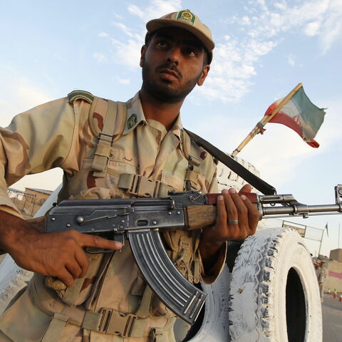 Iranian soldiers keep watch at a patrol post in Zabol, southeastern Iran, near the Afghan border, on Oct. 10, 2012. 