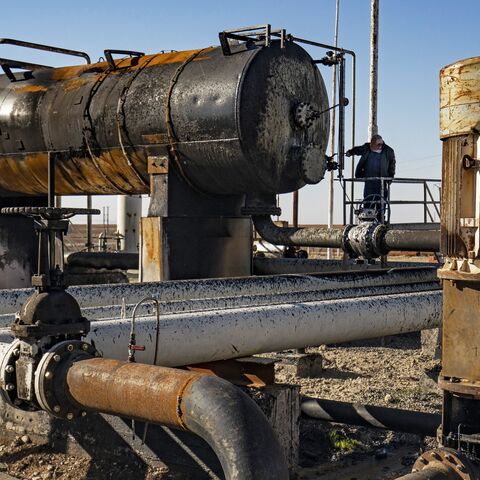 An employee works at the Rmailan oil field in the northeastern Syria, near the border with Turkey, on Jan. 8, 2025.