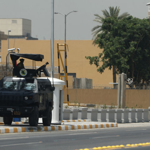 Armoured vehicles of the Iraqi Counter Terrorism Forces are deployed outside the US embassy building in Baghdad's Green Zone on June 12, 2025, after an announcement by a US official the previous day that staff levels at the diplomatic mission in Iraq were being reduced over security concerns. Despite reporting progress in earlier rounds of talks between Iran and the United States, tensions have reached a fever pitch this week as Washington moved non-essential staff from bases in the region following US medi