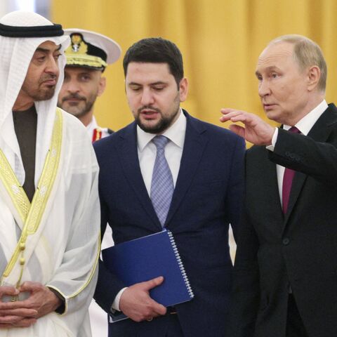 In this pool photograph distributed by the Russian state agency Sputnik, Russia's President Vladimir Putin and Emirati President Sheikh Mohamed bin Zayed Al Nahyan walk at the Kremlin following their talks in Moscow on August 7, 2025. (Photo by Gavriil Grigorov / POOL / AFP) (Photo by GAVRIIL GRIGOROV/POOL/AFP via Getty Images)