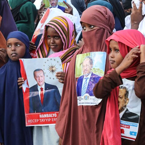 Somalis celebrate the victory of Turkish President Recep Tayyip Erdogan after he won the presidential run-off election during the celebration organized by the government in Mogadishu, on May 29, 2023.