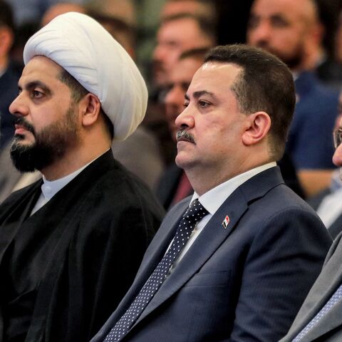 (L to R) Iraqi President Abdul Latif Rashid; Qais al-Khazali, head of the "Asaib Ahl al-Haq"; one of the member factions of the Hashd al-Shaabi (Popular Mobilization Forces) paramilitaries; Prime Minister Mohammed Shia al-Sudani; and former Prime Minister Nuri al-Maliki attend an event commemorating the 21st anniversary of the group's creation at a hotel in Baghdad on May 3, 2024.