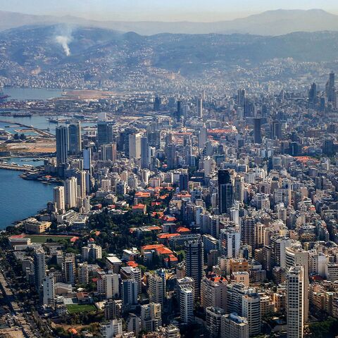 This aerial view taken from a Hellenic Air Force aircraft carrying medical aid supplies to Lebanon shows the skyline and port of Beirut during the landing approach towards Beirut International Airport on October 25, 2024. Israel expanded operations in Lebanon nearly a year after Hezbollah began exchanging fire in support of its ally, Hamas, following the Palestinian group's deadly attack on Israel on October 7, 2023. (Photo by ORESTIS PANAGIOTOU / POOL / AFP) (Photo by ORESTIS PANAGIOTOU/POOL/AFP via Getty 