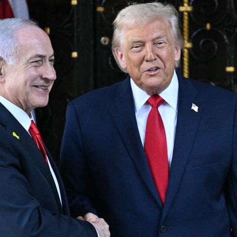 US President Donald Trump (R) greets Israeli Prime Minister Benjamin Netanyahu (L) at Trump's Mar-a-Lago residence in Palm Beach, Florida, Dec. 29, 2025.