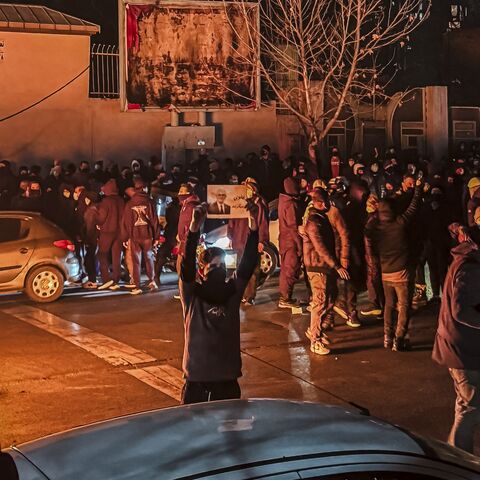 Iranians gather while blocking a street during a protest in Tehran, Iran, on Jan. 9, 2026.