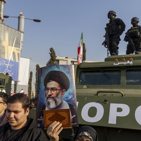 People attend a pro-government rally on Jan. 12, 2026, in Tehran, Iran.