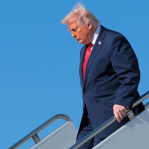 US President Donald Trump departs Air Force One after arriving at Palm Beach International Airport on Jan. 16, 2026. 