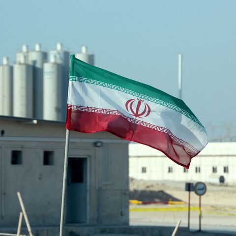A picture taken on November 10, 2019, shows an Iranian flag in Iran's Bushehr nuclear power plant, during an official ceremony to kick-start works on a second reactor at the facility. 