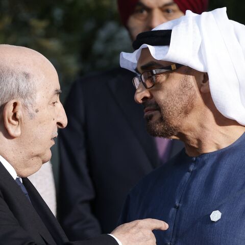 Algeria's President Abdelmadjid Tebboune (L) speaks with UAE President Sheikh Mohamed bin Zayed during the G7 Summit hosted by Italy, in Savelletri, on June 14, 2024.