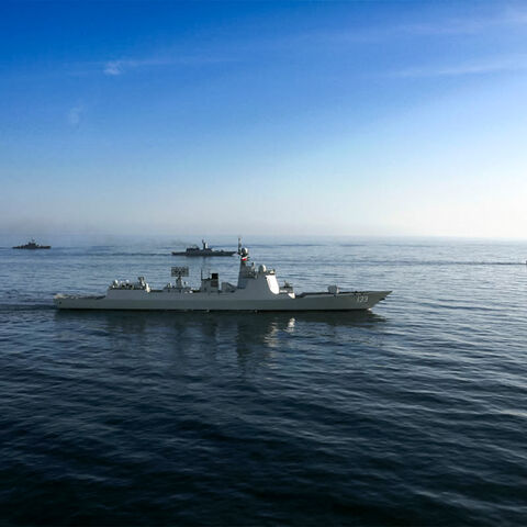 This handout photo made available by the Iranian Army Office on March 11, 2025 shows the Chinese People's Liberation Army Navy guided-missile destroyer Baotou (133) during joint military drills between Iran, Russia, and China in the Gulf of Oman.
