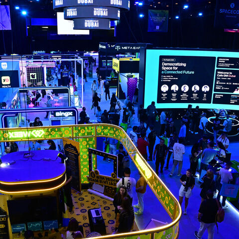 Participants visit the Token 2049 crypto conference in Dubai on May 1, 2025. 