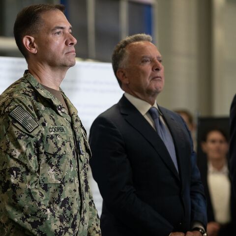 Steve Witkoff, US special envoy to the Middle East, (C) Adm. Brad Cooper, commander of the United States Central Command (CENTCOM), (L) and Jared Kushner listen as US Vice President JD Vance speaks.