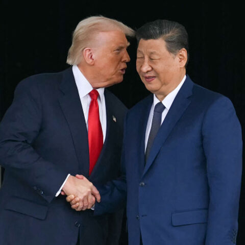 US President Donald Trump and Chinese President Xi Jinping shake hands after talks at the Gimhae Air Base, in Busan, Oct. 30, 2025. (Andrew Caballero-Reynolds/AFP via Getty Images)